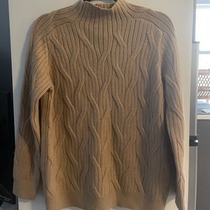 Beautiful brown couture sweater! Worn maybe twice. Cozy and classy.